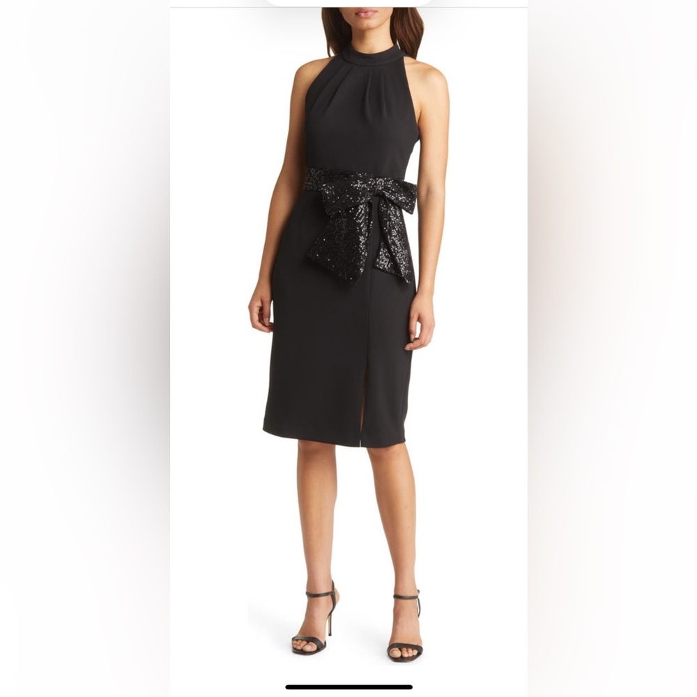 Pretty black dress with sequin details.